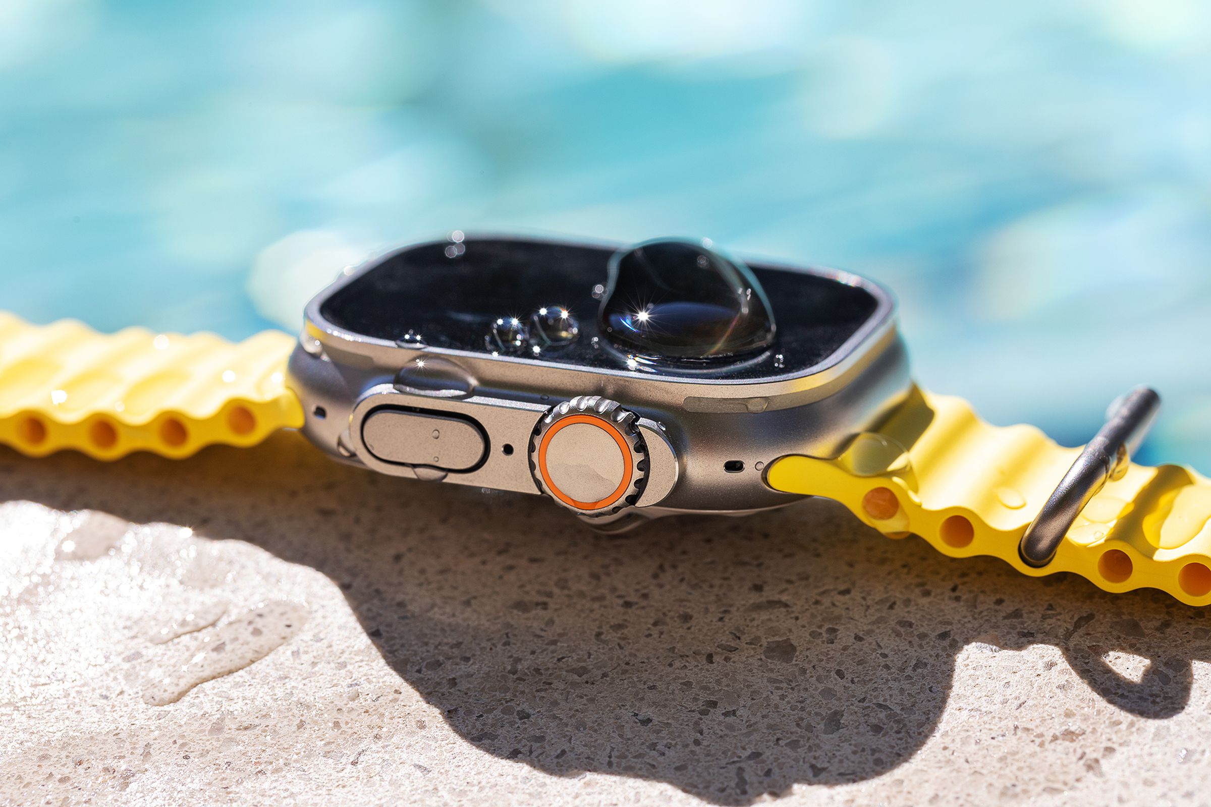 Side view of Apple Watch with Ocean band at the pool