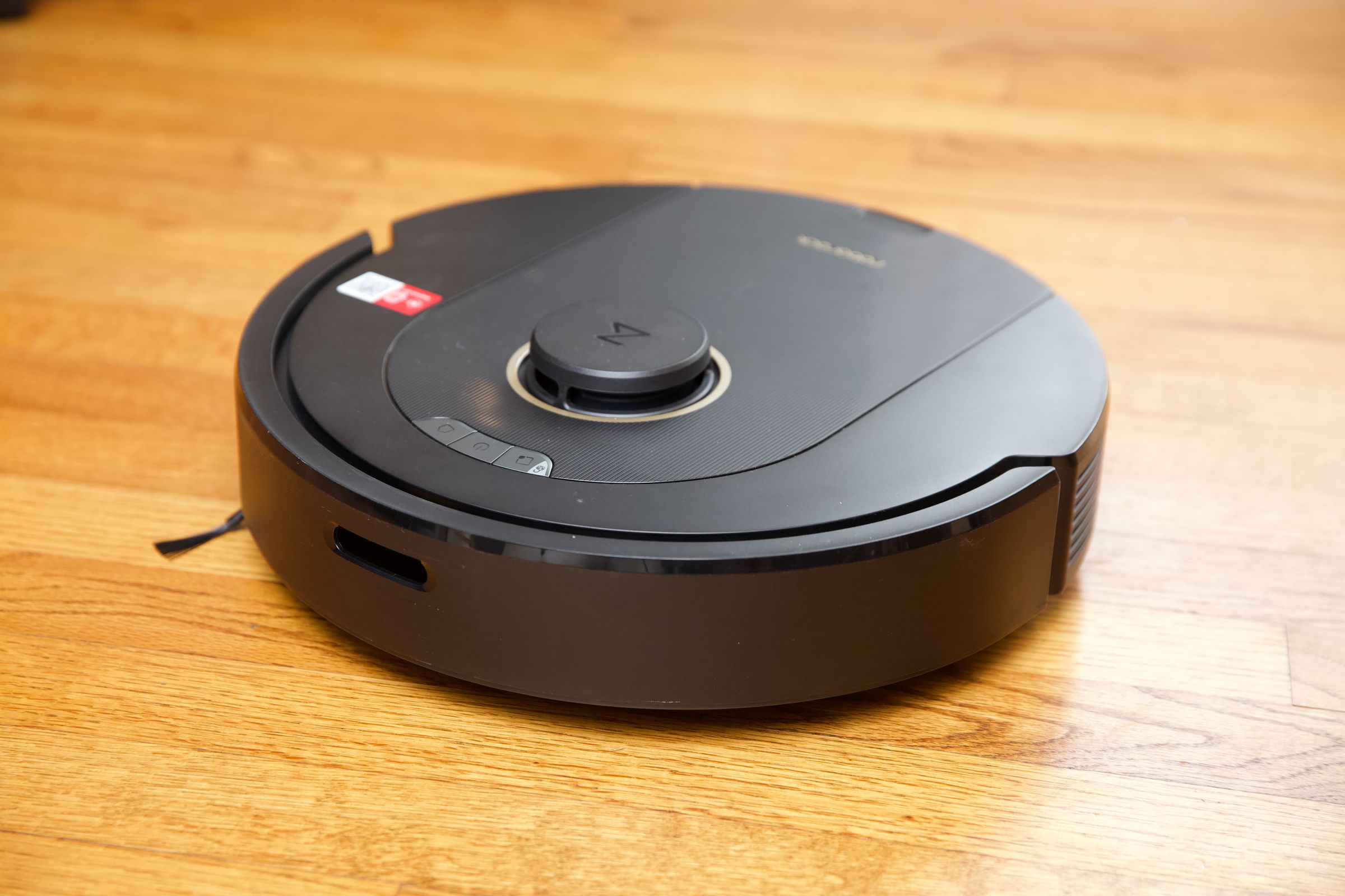 Roborock's Q5 Pro on a hardwood floor.