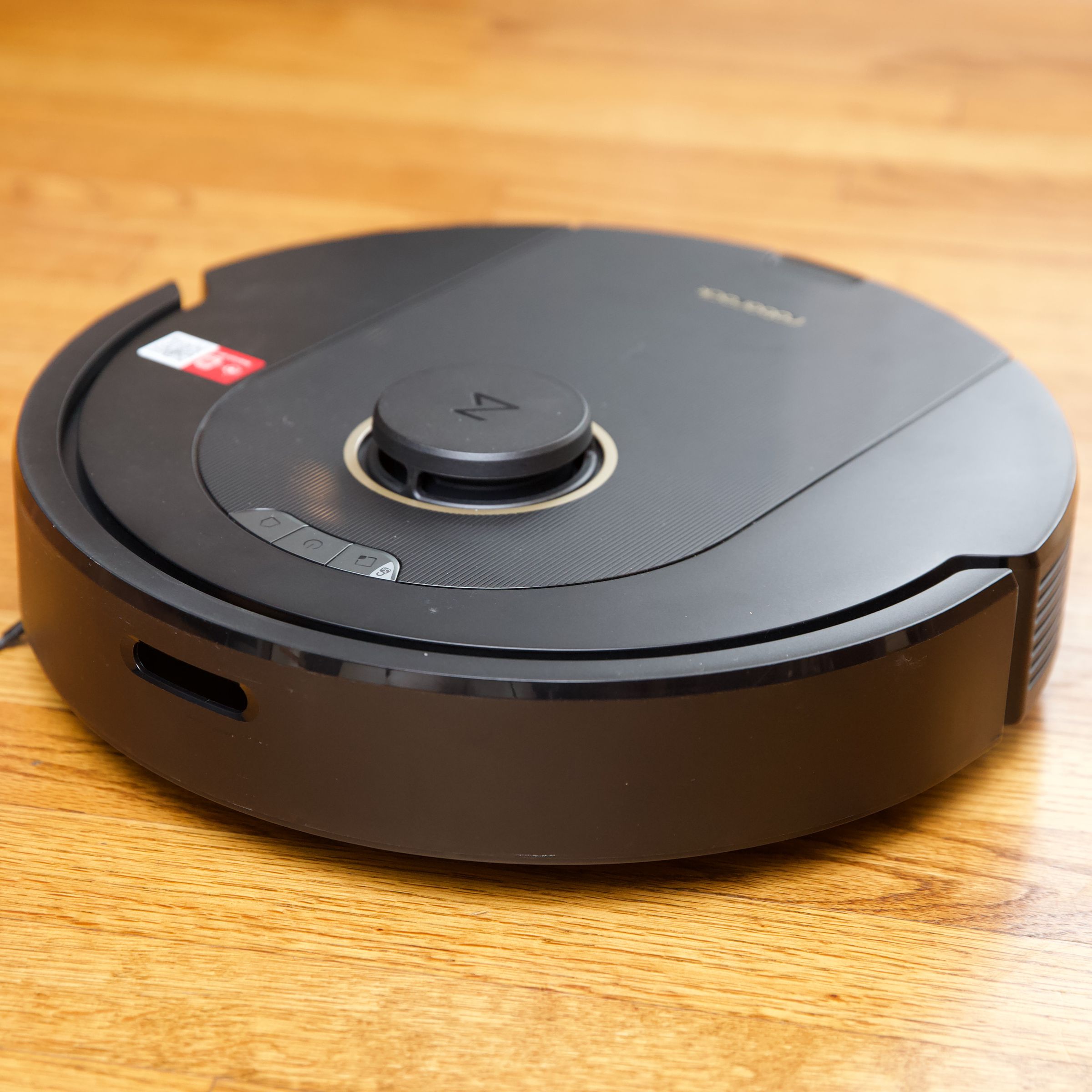 Roborock's Q5 Pro on a hardwood floor.