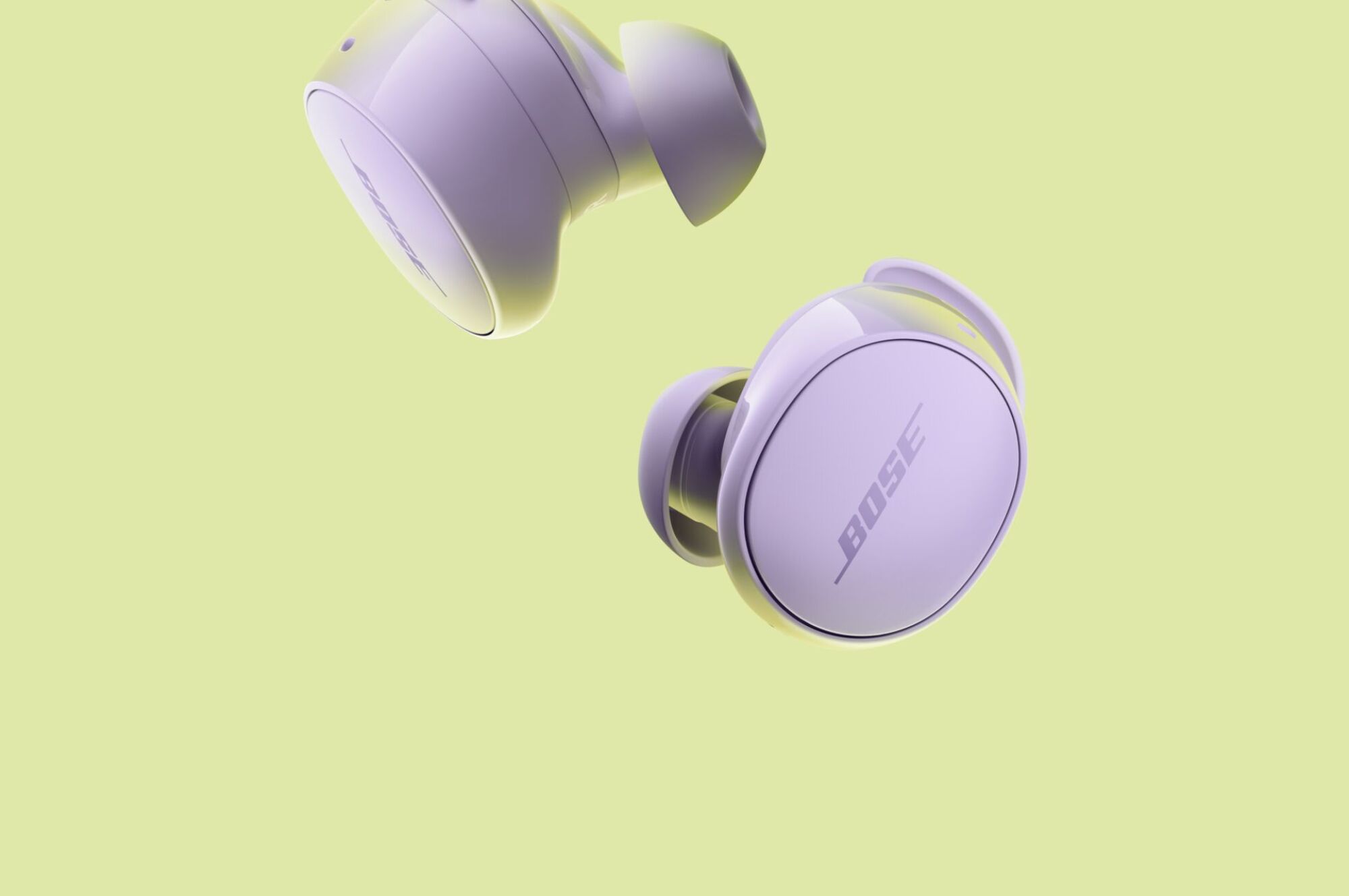 Ένα ζευγάρι ακουστικά Bose QuietComfort σε Chilled Lilac.