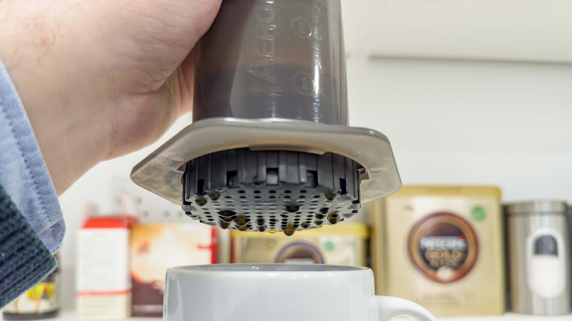 Aeropress coffee maker in use