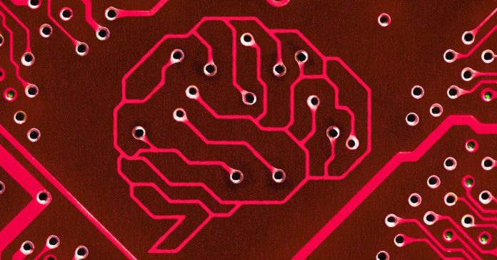 Photo illustration of a brain on a circuit board in red.