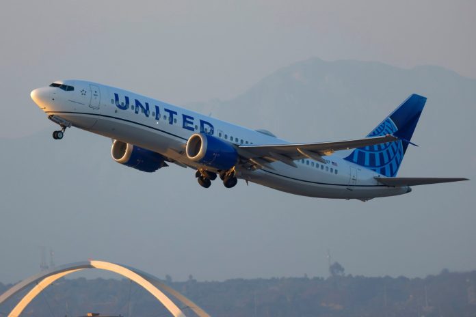 A United Airlines Boeing 737 MAX 8 departs from Los Angeles International Airport en route to San Salvador on September 1, 2024 in Los Angeles, California.