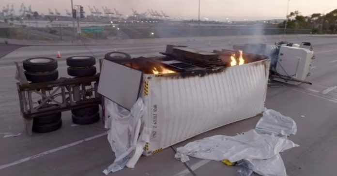 A container truck burns outside the Port of Los Angeles.