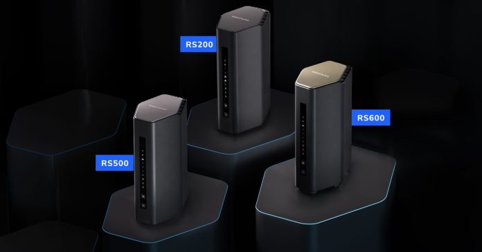 Netgear’s new Nighthawk routers, all three tower-style and similar in appearance, grouped together in a triangle configuration.