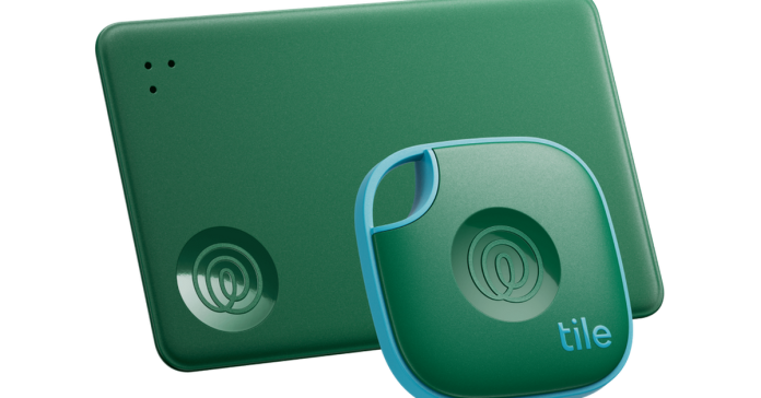 A sea green credit card-sized item tracker, next to a sea green keychain in the shape of a rounded rectangle. 