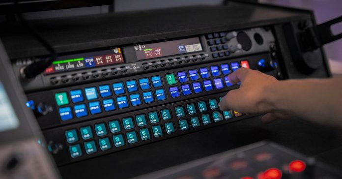 The Elgato Stream Deck Studio mounted in a rack in a broadcast control room.