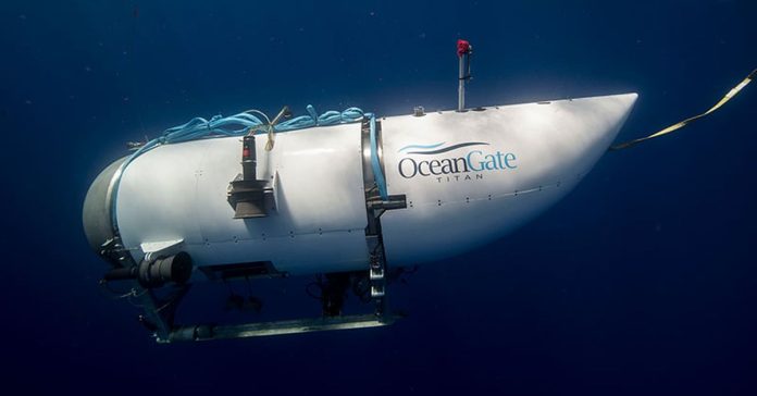 An image of the OceanGate Titan from the side as it sits underwater.